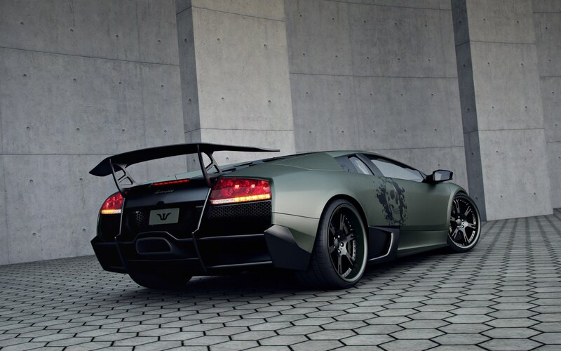 green lamborghini with rear wing