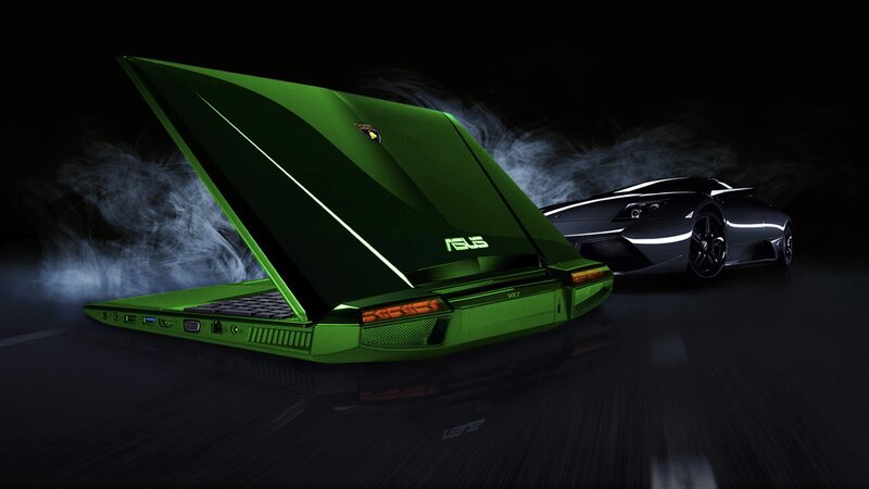 green laptop and sports car