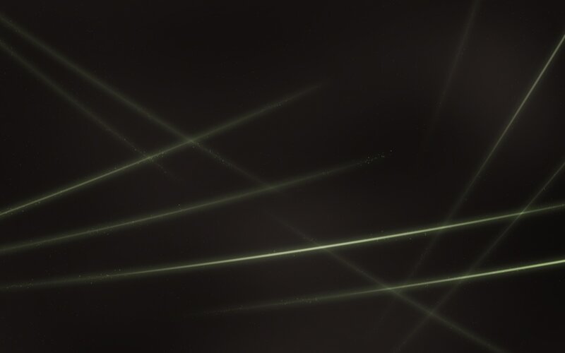 green laser beams in dark space
