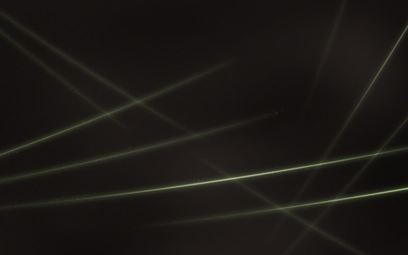 green laser beams in dark space