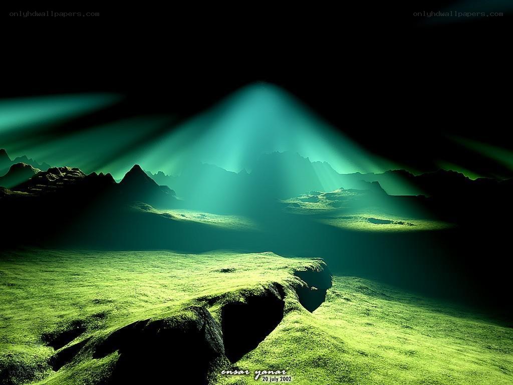 Green light beams over mountains