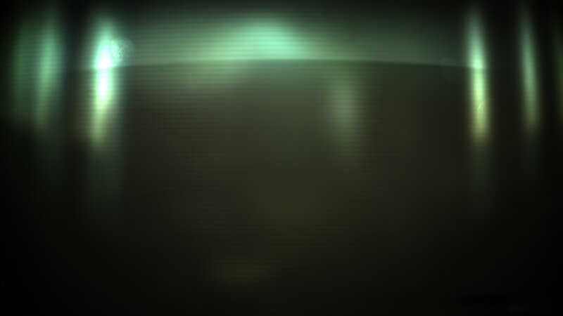 green light on dark screen
