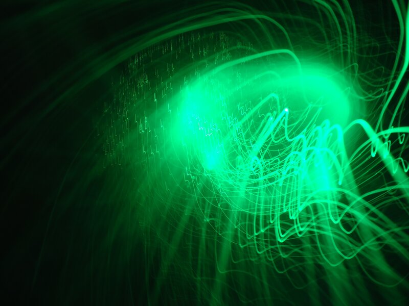 green light trails in motion