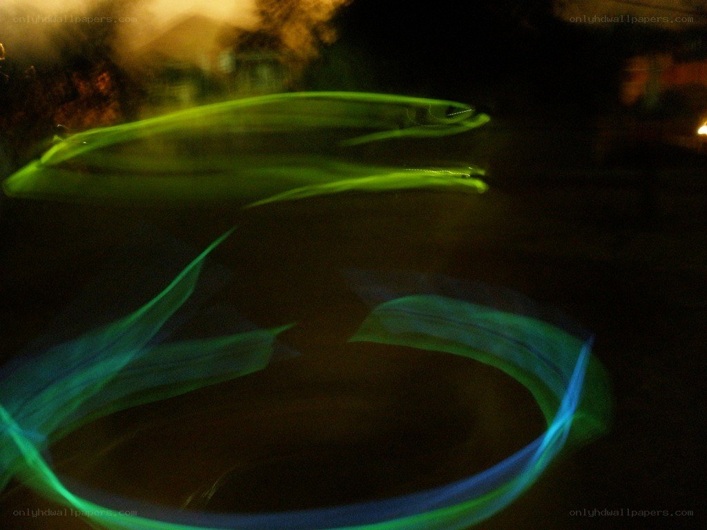 Green light trails in motion