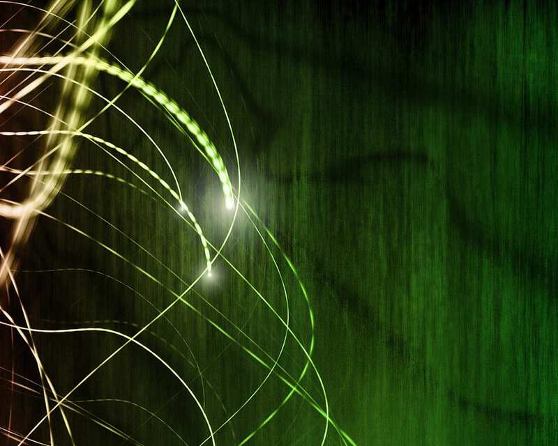 green light trails on dark background
