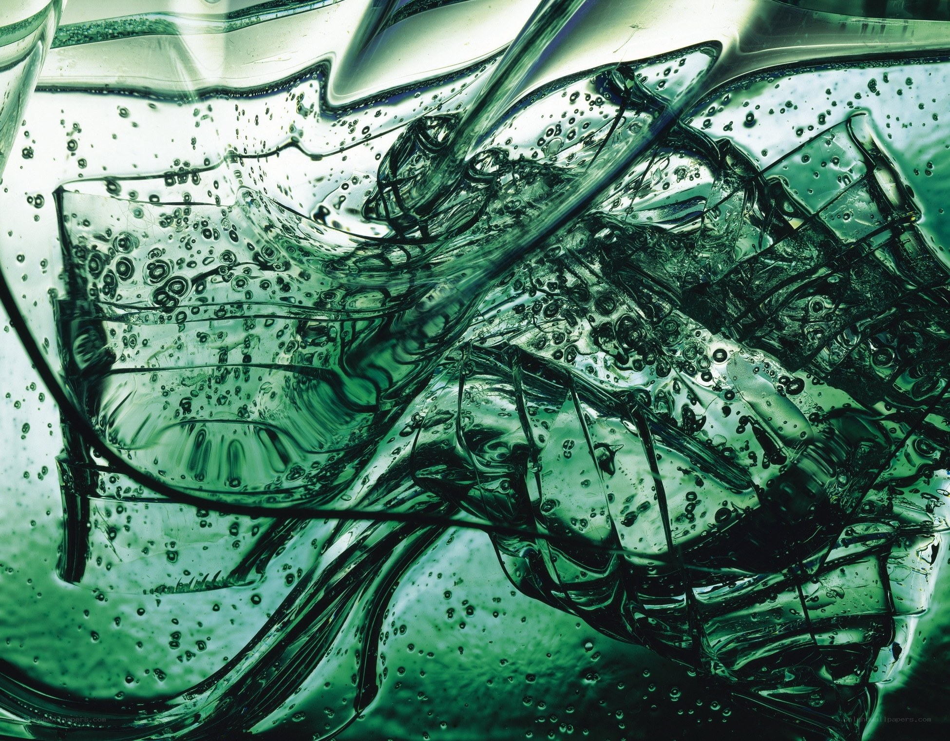 green liquid bubbles in glass