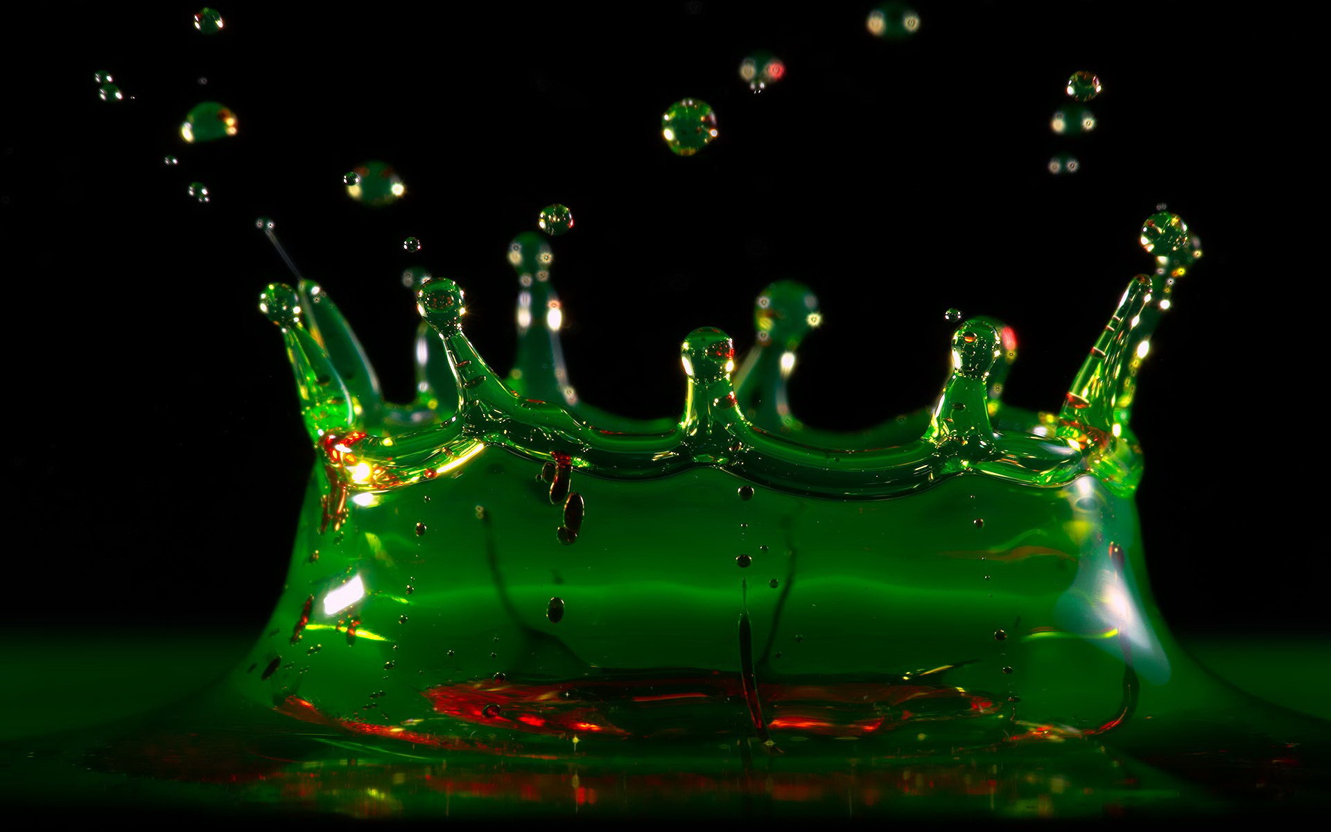 Green liquid crown splash