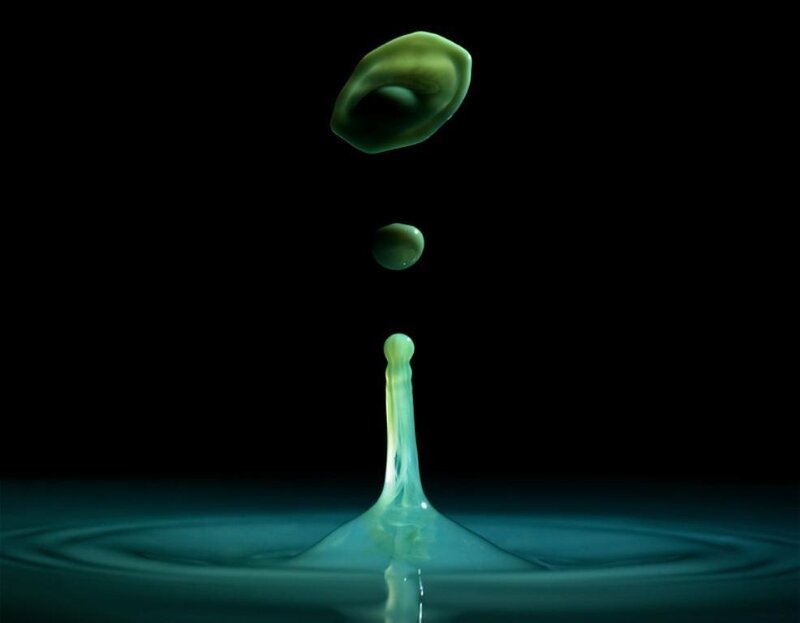 green liquid drop splash