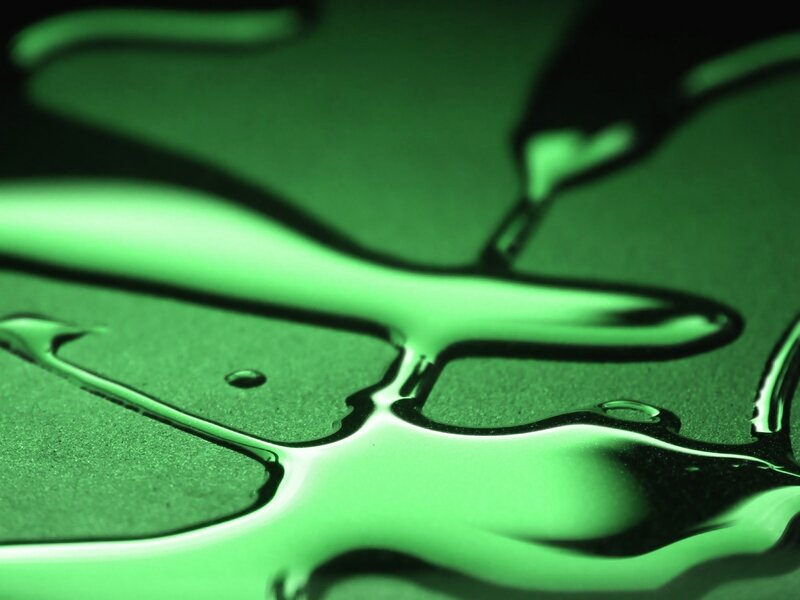 green liquid flowing on surface