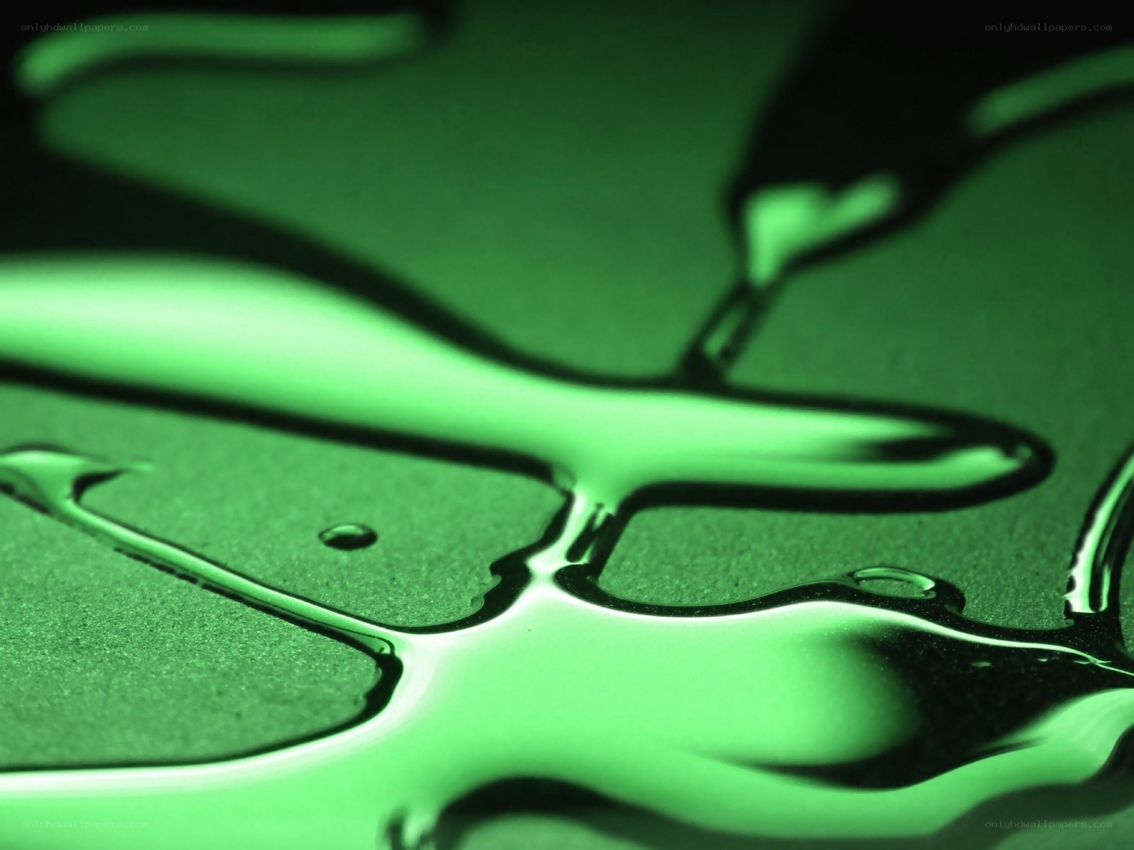 green liquid flowing on surface