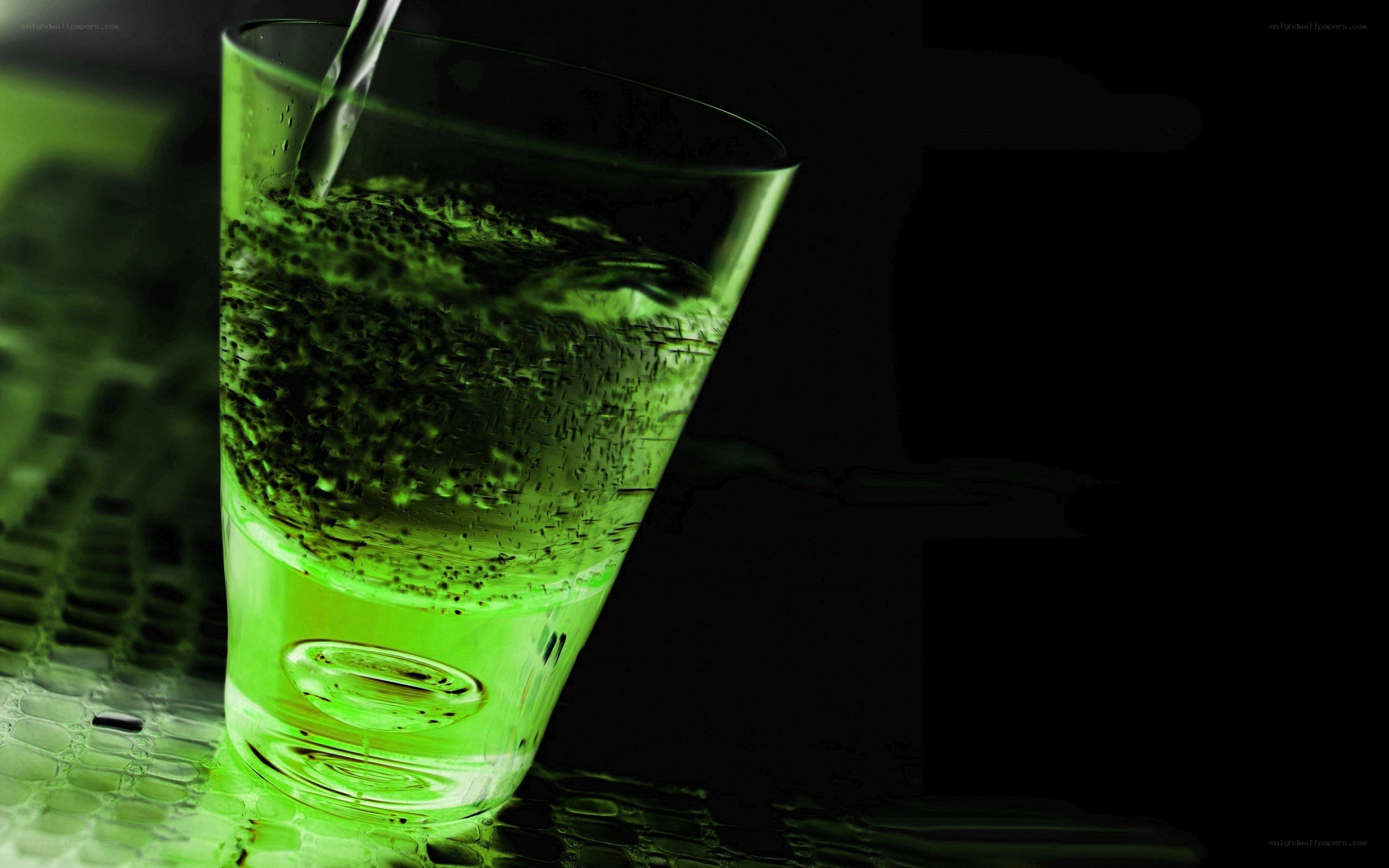 green liquid in a glass