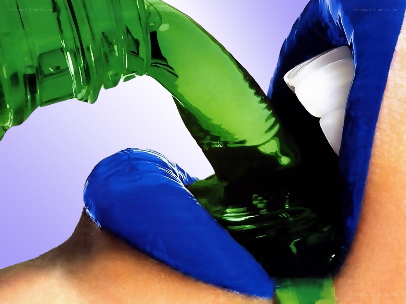 green liquid pouring into blue container