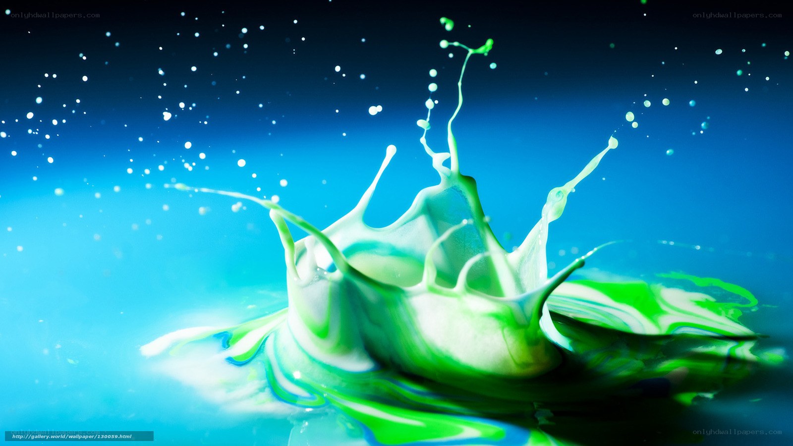 green liquid splash in water