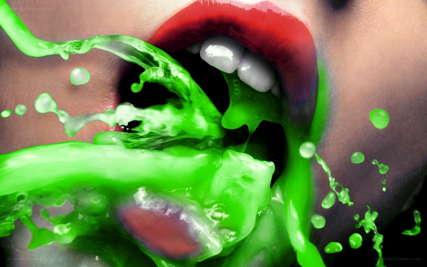 green liquid splashing from mouth