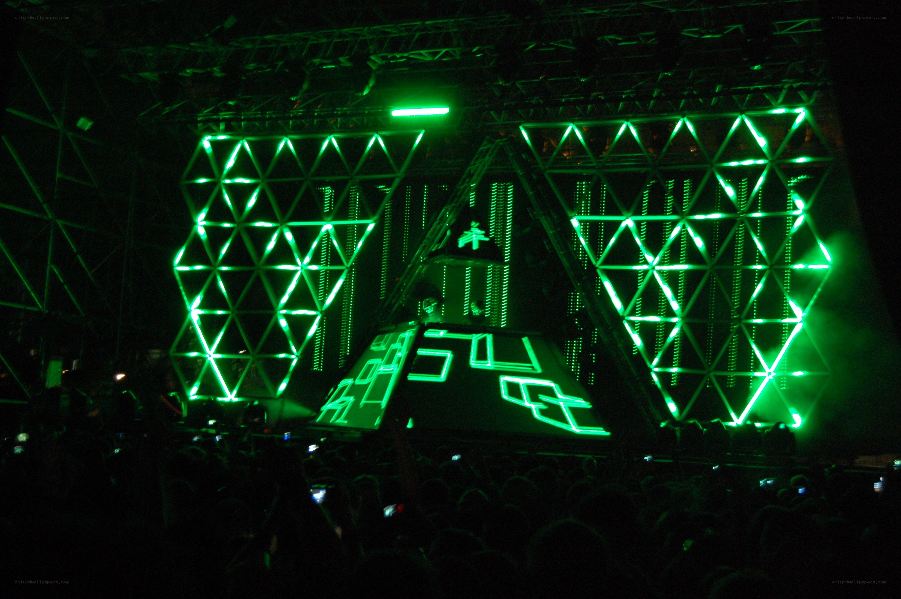 green-lit concert stage