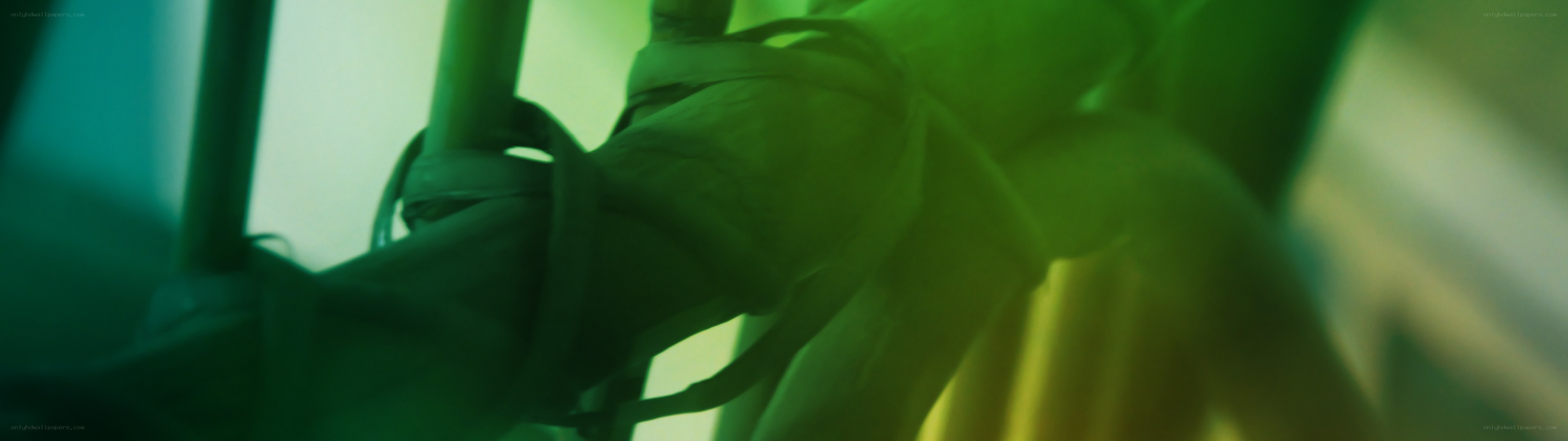 green-lit hand on pole