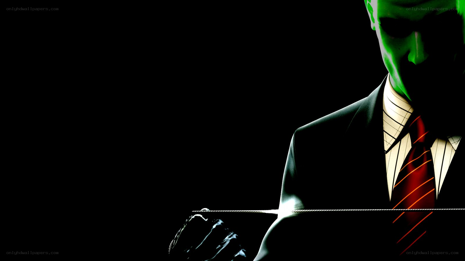 green-lit man in suit