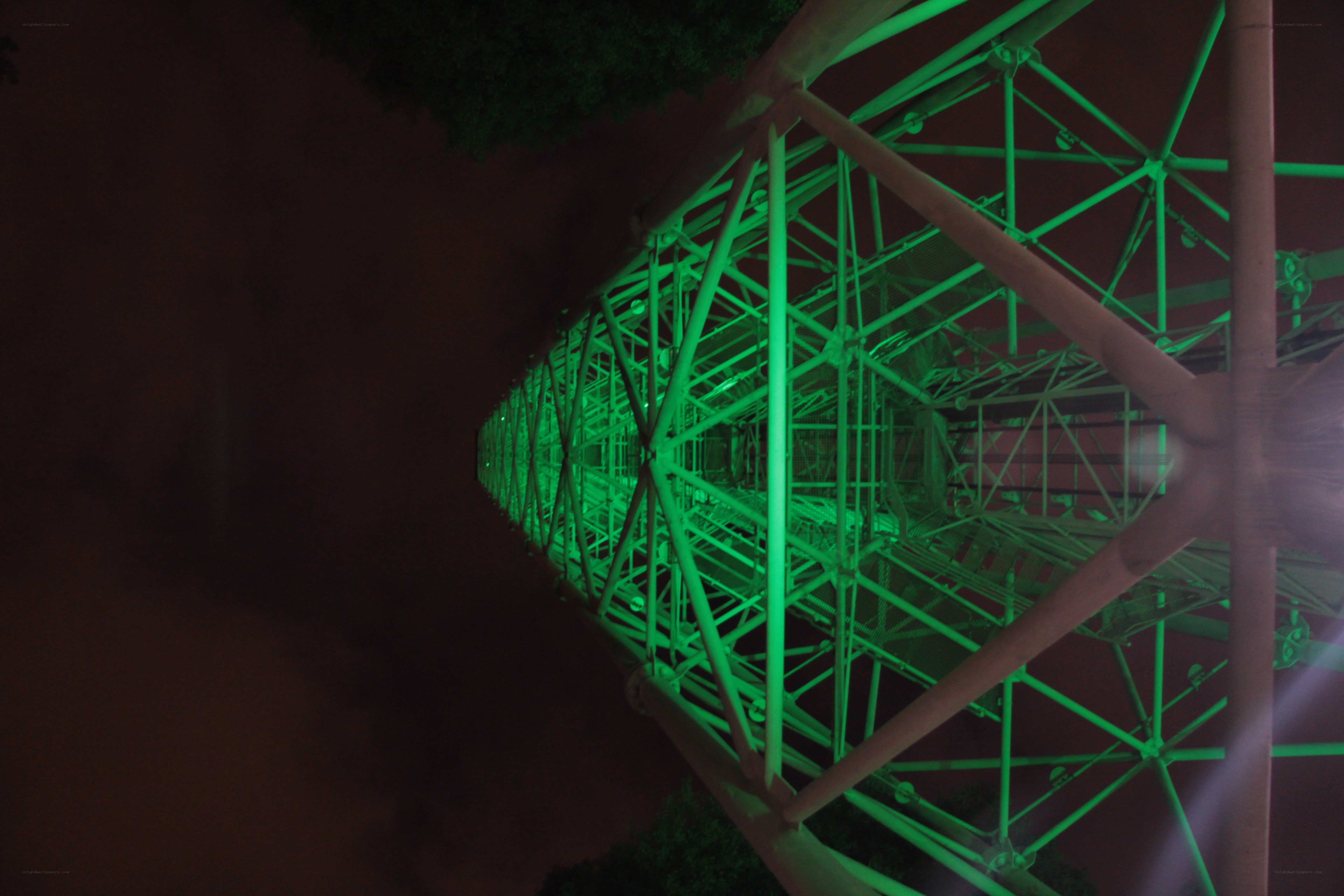 green-lit tower structure