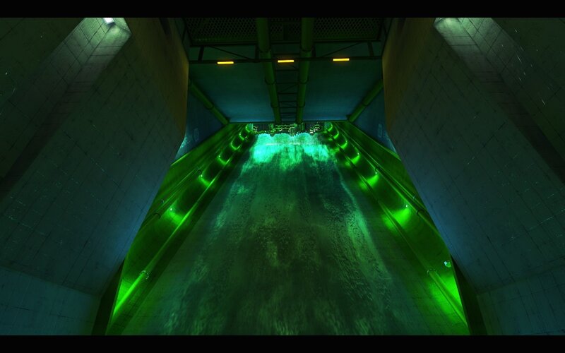 green-lit water tunnel