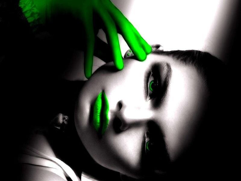 green-lit woman portrait