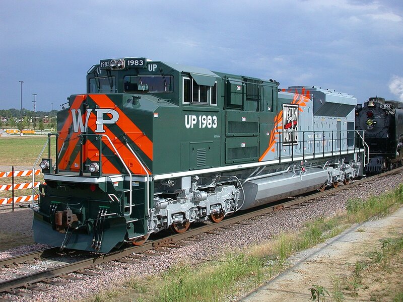 Green Locomotive on Tracks