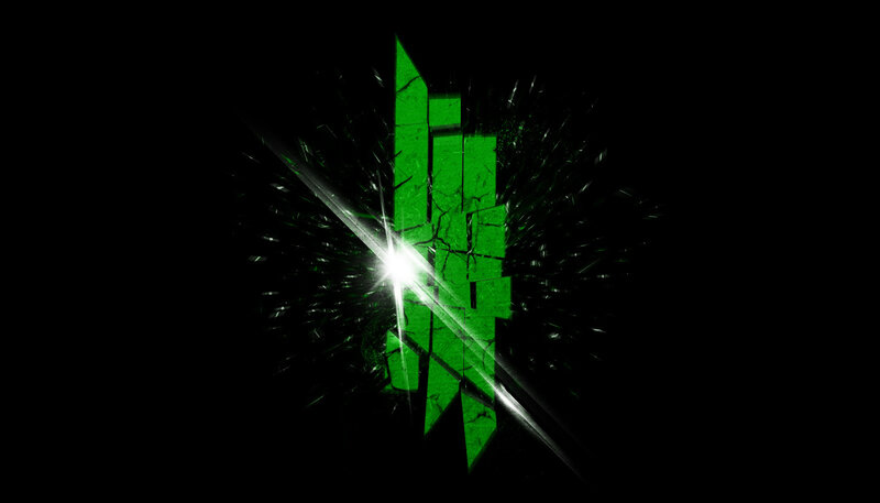 green logo with light burst