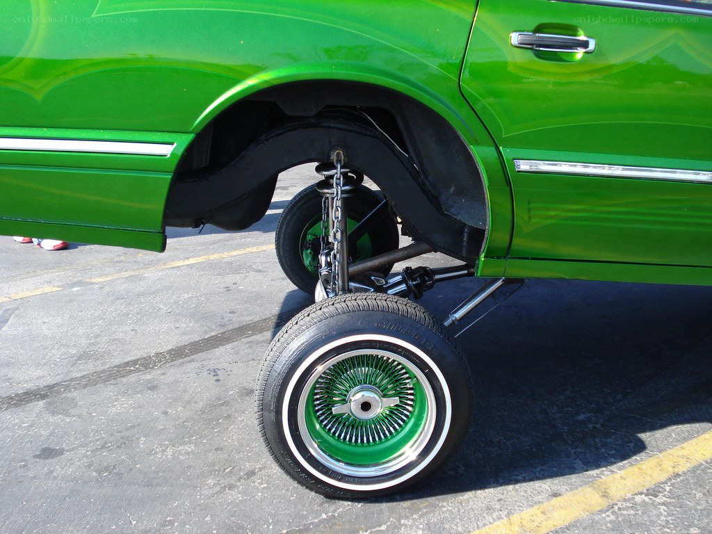 green lowrider car wheel