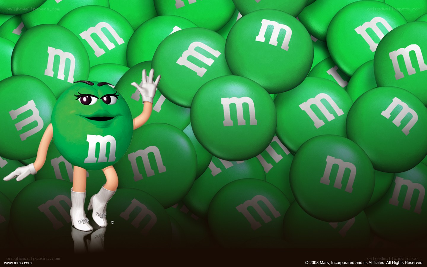 Green M&M character waving