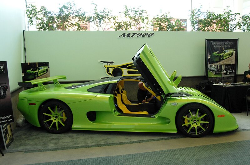 Green M7900 sports car on display