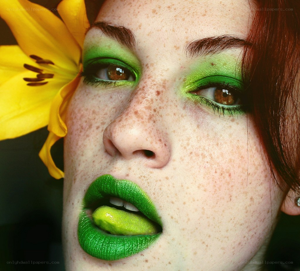 green makeup with yellow flower