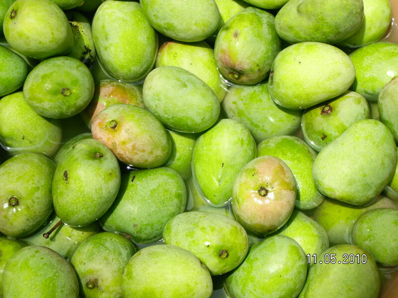 Green Mangoes in Water