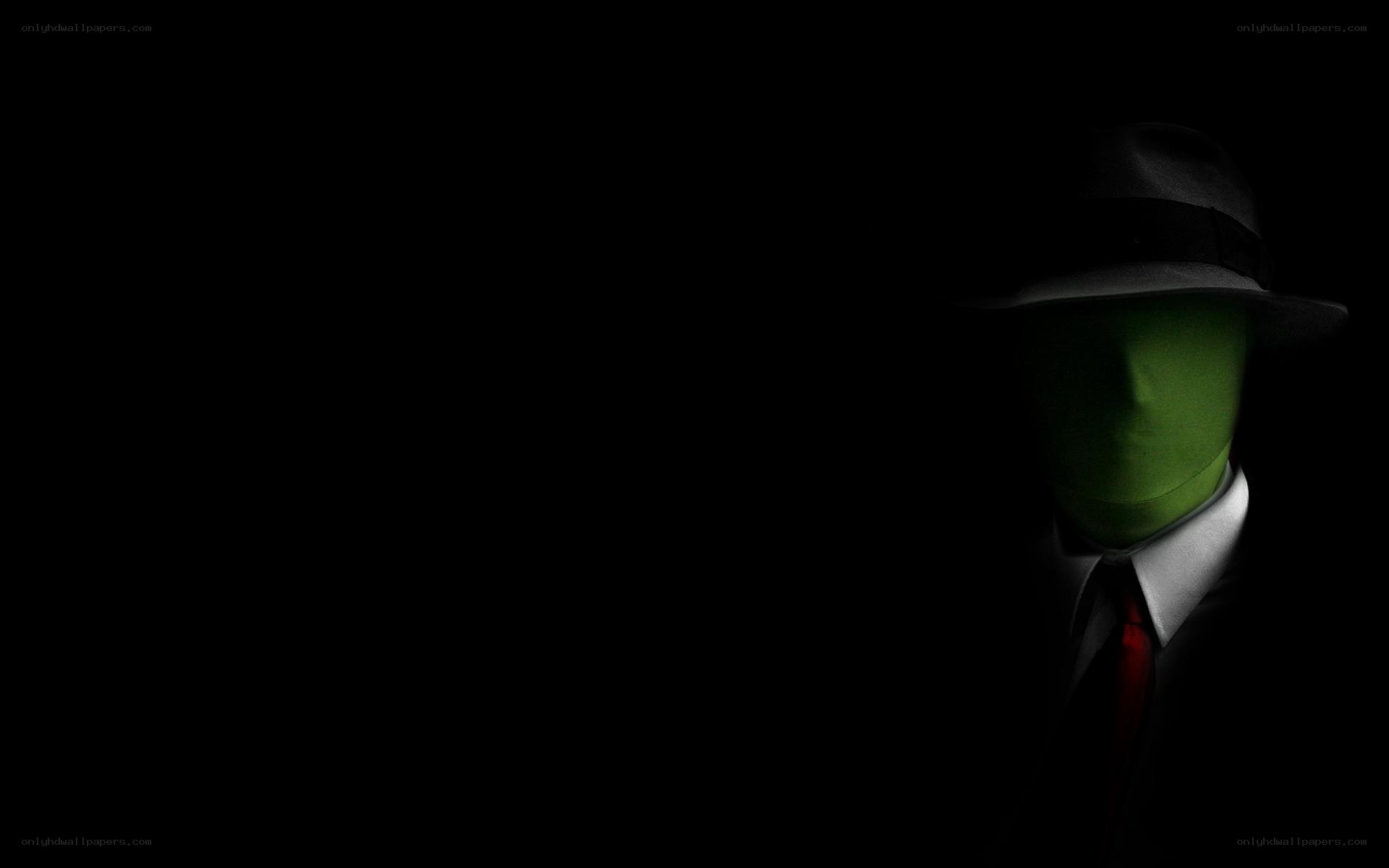 green mask man in suit