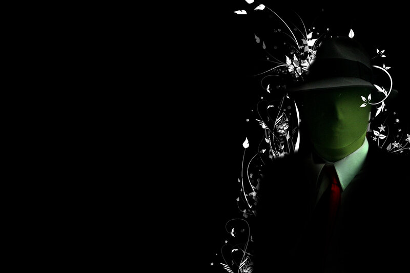green mask man with floral design