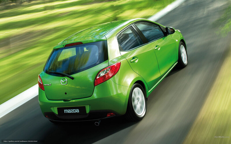 Green Mazda 2 Car