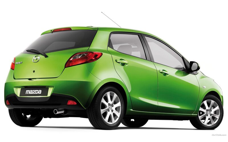 green mazda 2 hatchback