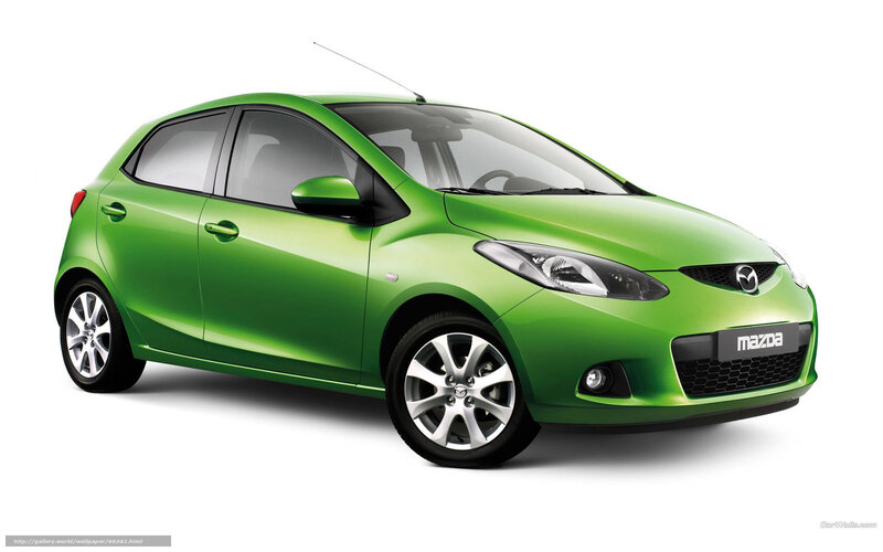 green mazda hatchback car