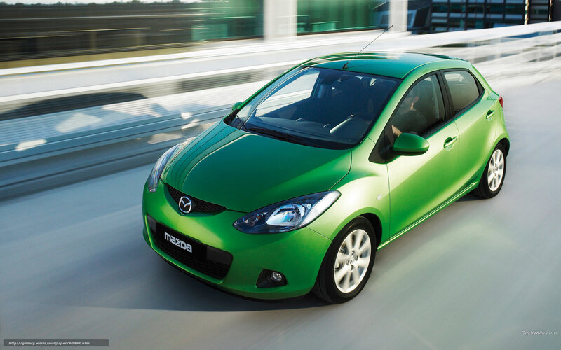 Green Mazda Hatchback — Dynamic