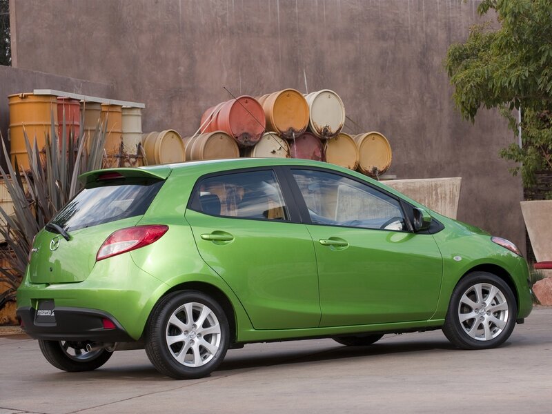 Green Mazda Hatchback — Neutral, Afternoon