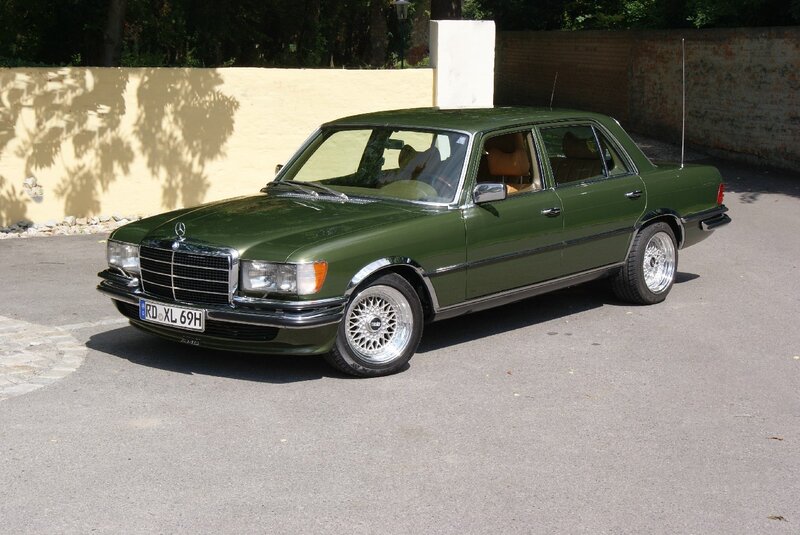 Green Mercedes-Benz sedan