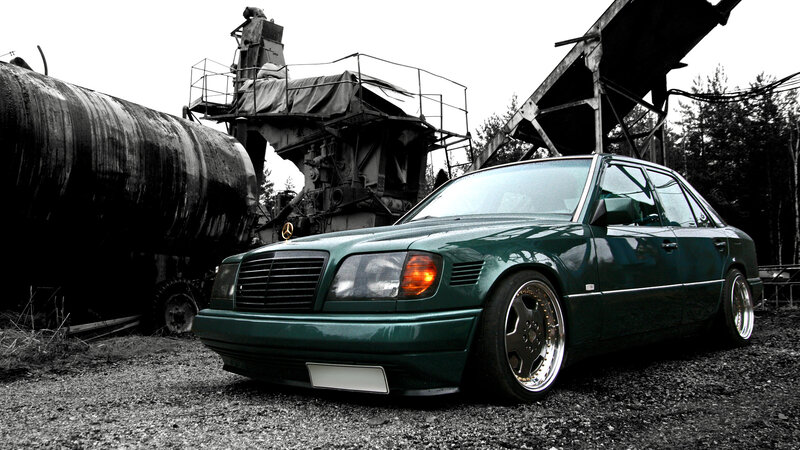 green mercedes in industrial setting