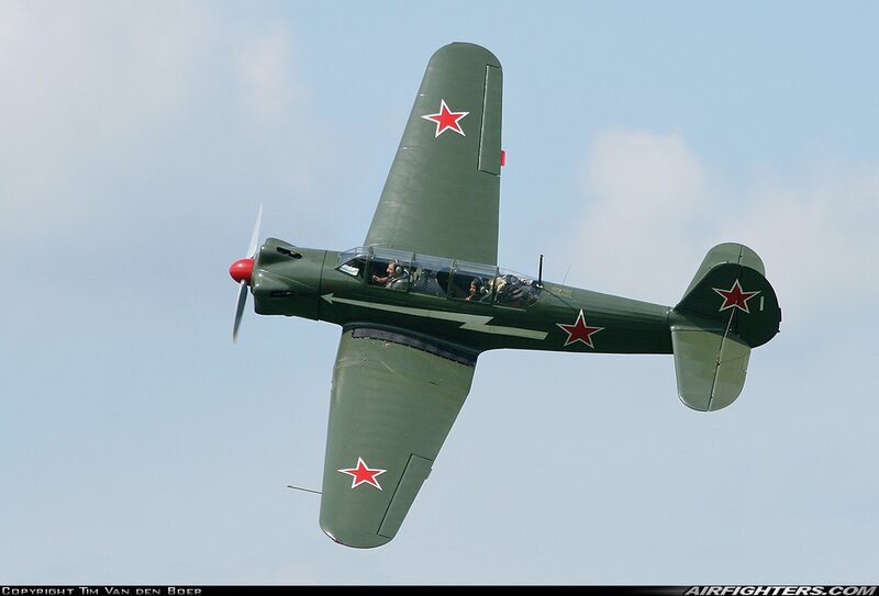 Green Military Aircraft — Calm, Afternoon
