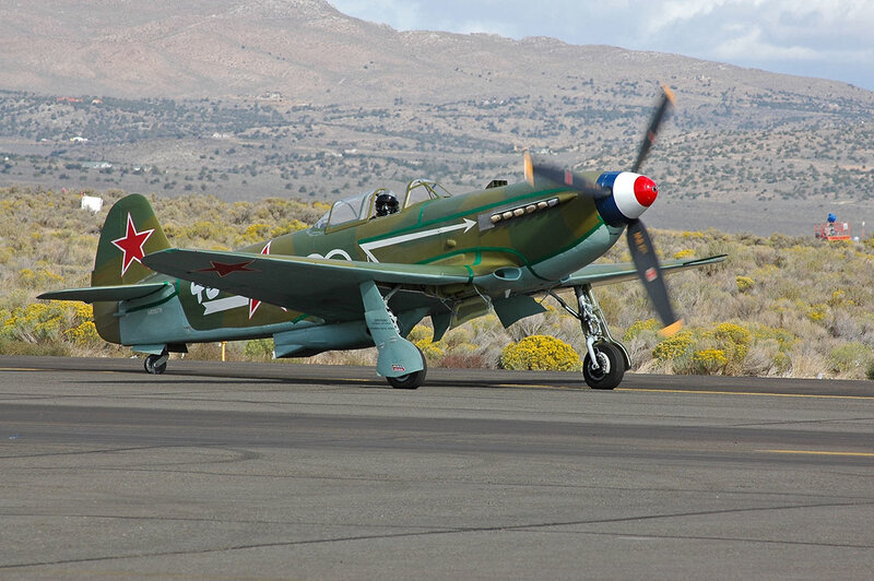 Green Military Airplane — Calm, Afternoon