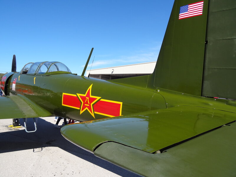 Green Military Airplane — Clear, Afternoon