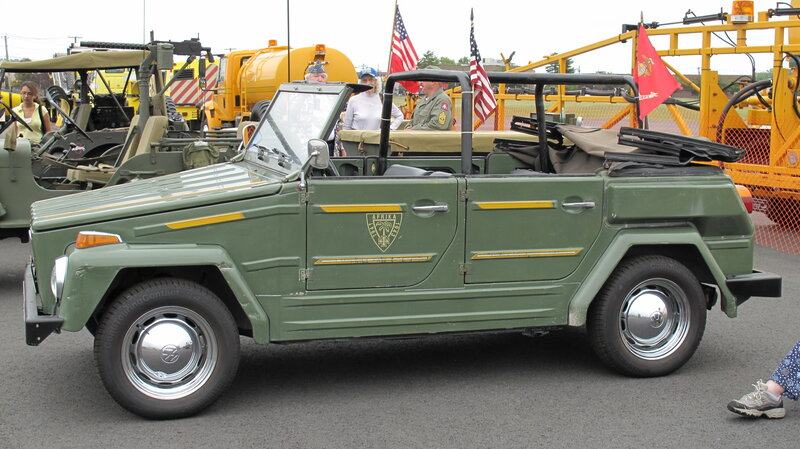 Green military jeep at parade