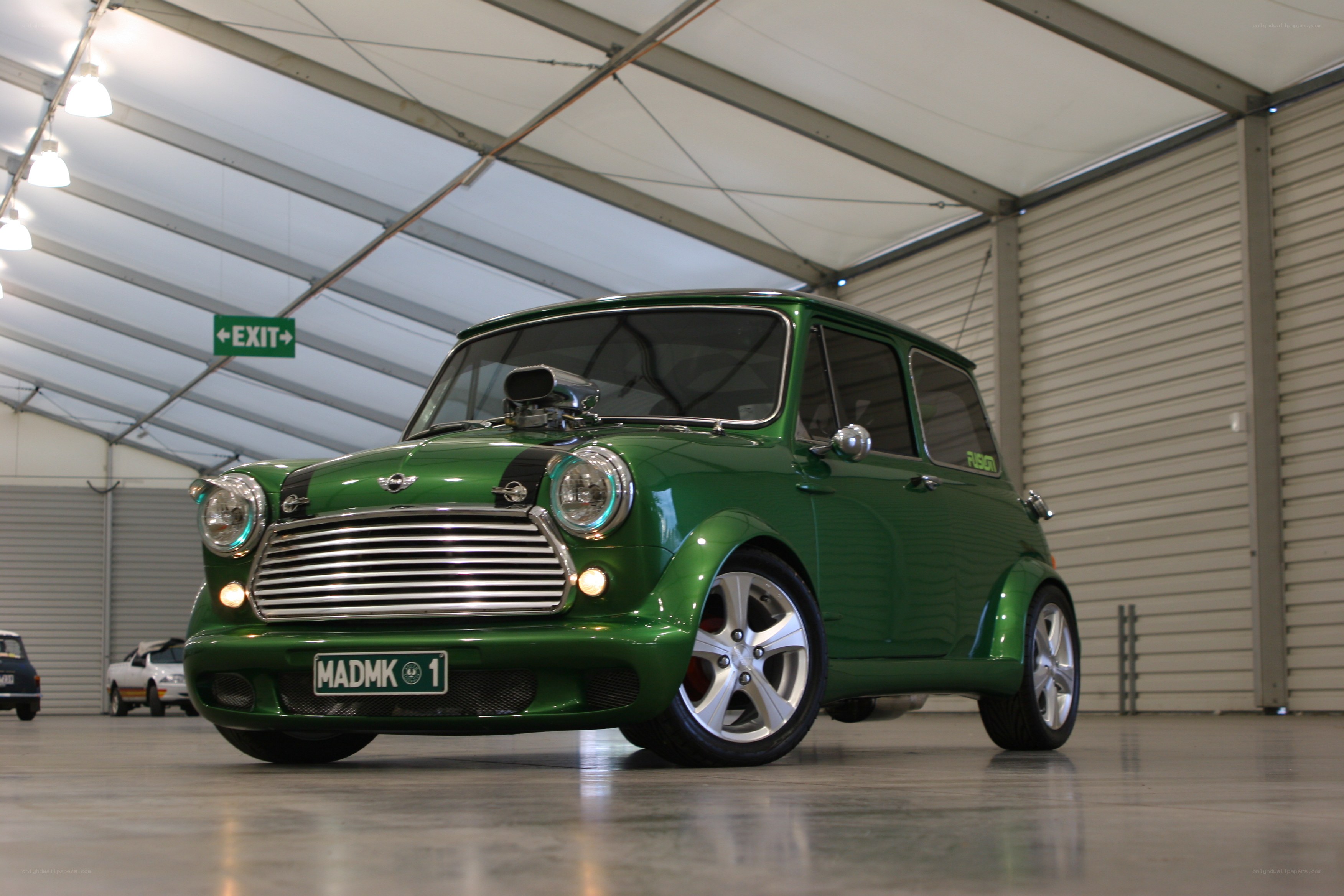 Green Mini Cooper in Garage
