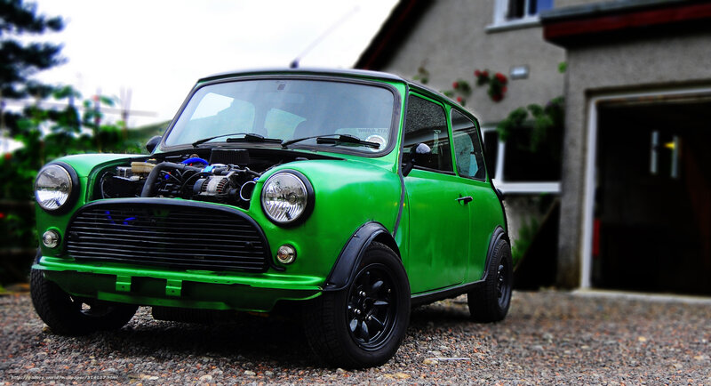 green mini cooper with open hood