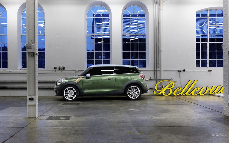 Green MINI Countryman in a warehouse