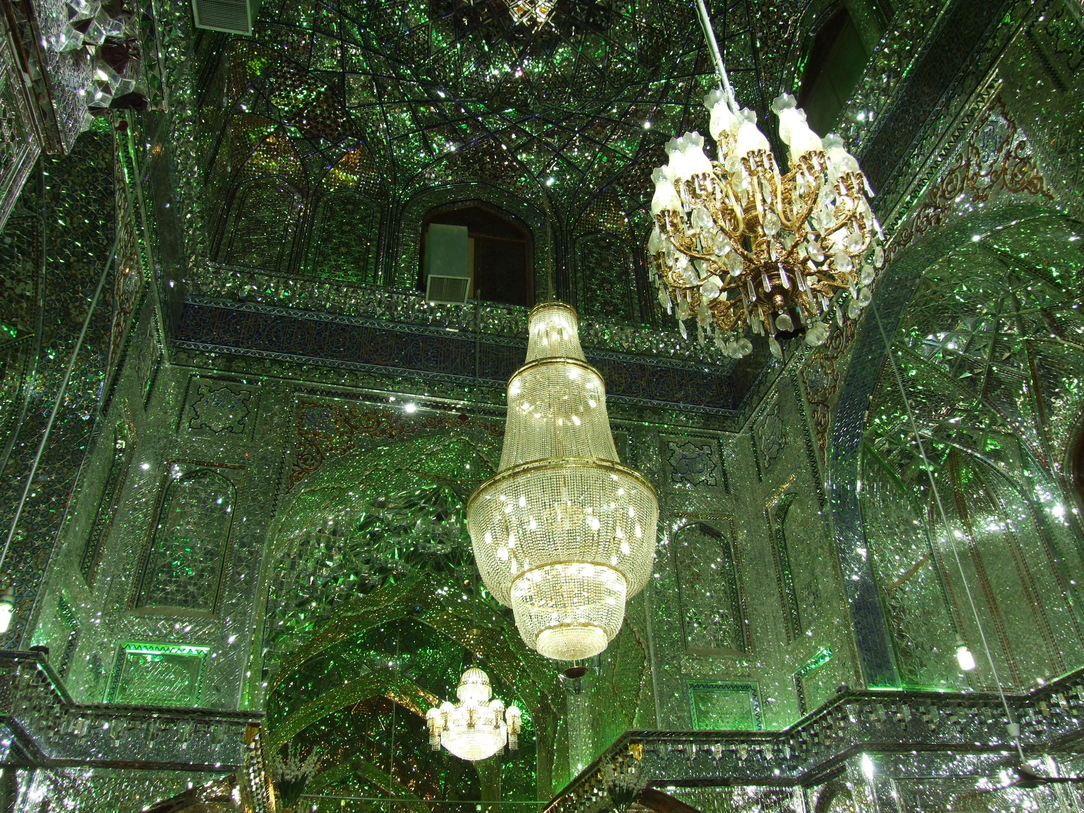 Green mirror hall with chandeliers