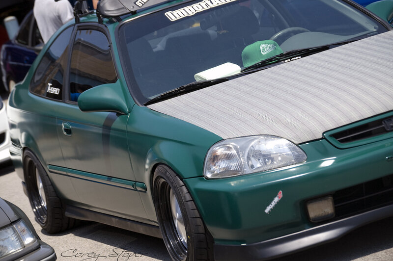 green modified car at show