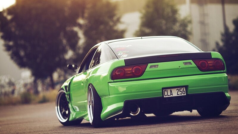 Green Modified Car — Dramatic, Sunset
